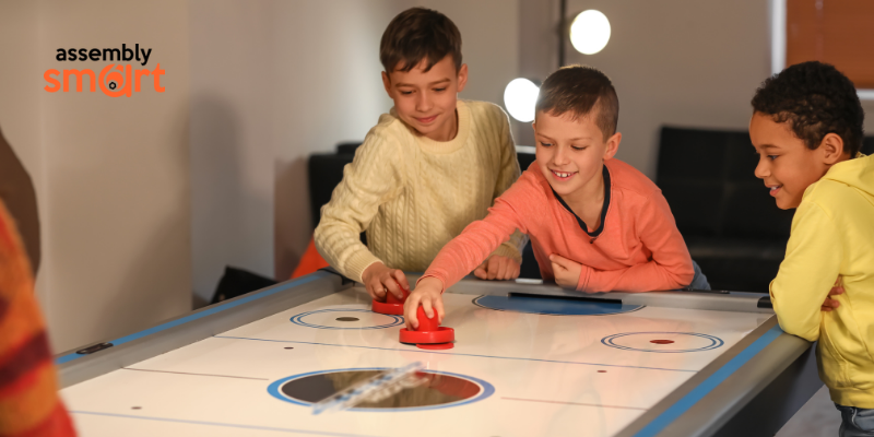 air-hockey-table-assembly kids playing